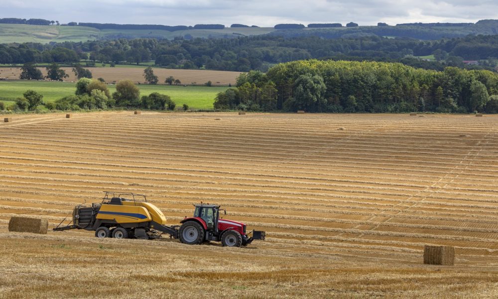 hay-baler-working-in-a-field-united-kingdom-2025-04-02-21-37-58-utc-min