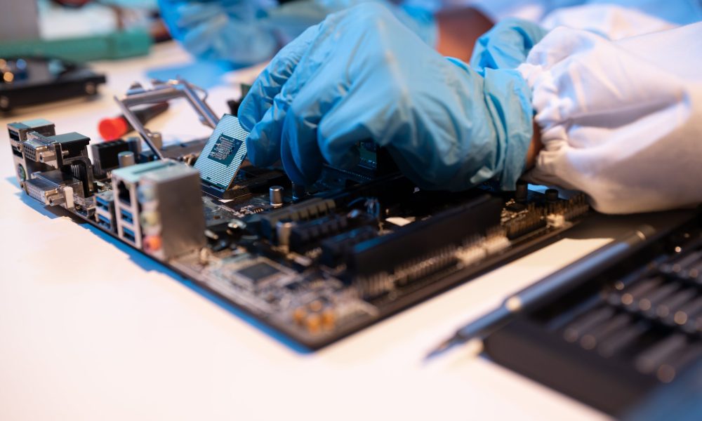 technician-measuring-voltage-electronic-circuit-bo-2024-12-19-20-36-24-utc-min